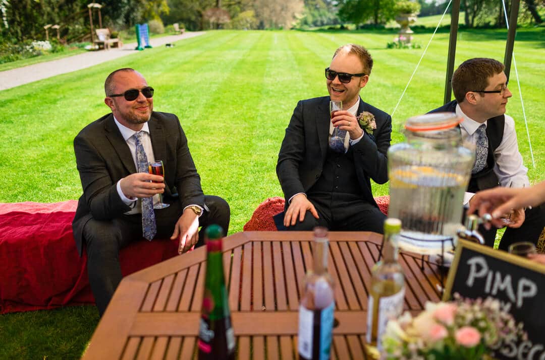 Relaxed guests enjoy a drink at Homme House wedding