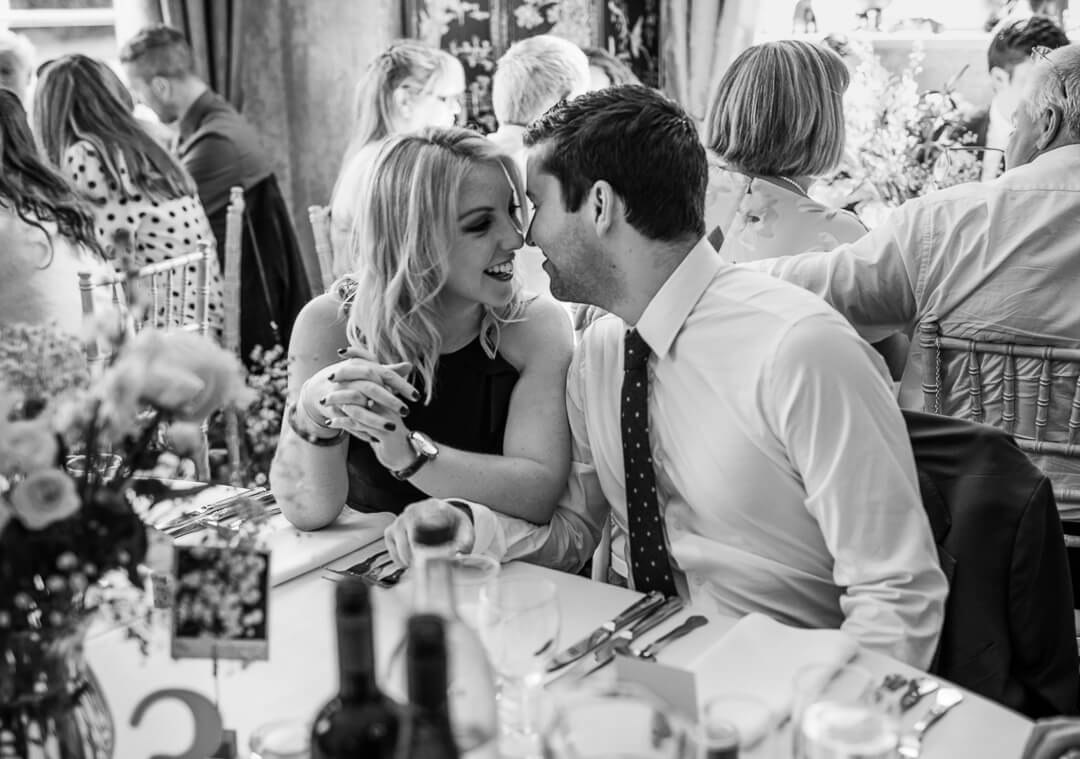 Guests getting intimate at wedding breakfast