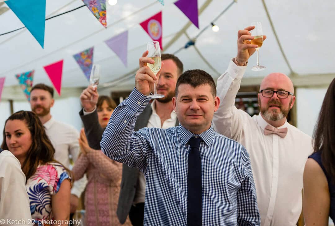 Wedding guests toasting