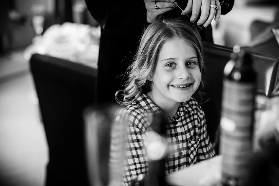 Flower girl getting ready at Portsmouth wedding