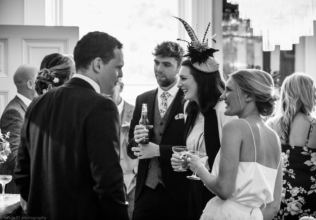 Wedding guests chatting at No 38