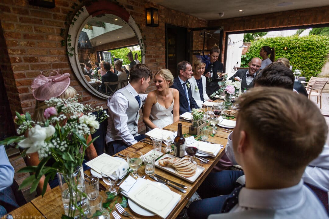 Bride and groom in dinning room