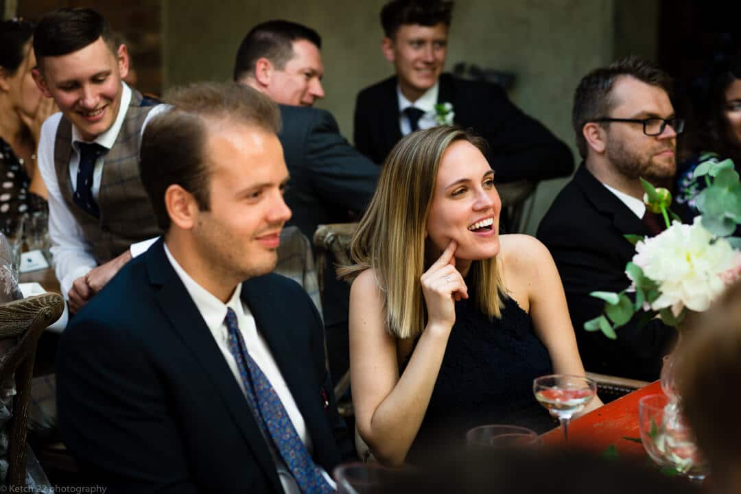 Wedding guests listening to speeches