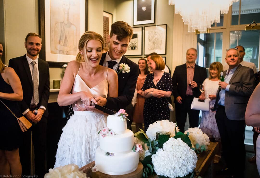 Cutting the wedding cake at No 38 Cheltenham