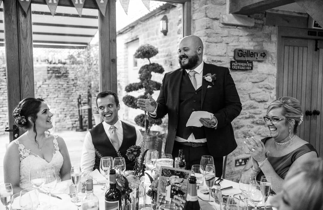 Best man making speech at Kingscote Barn Wedding