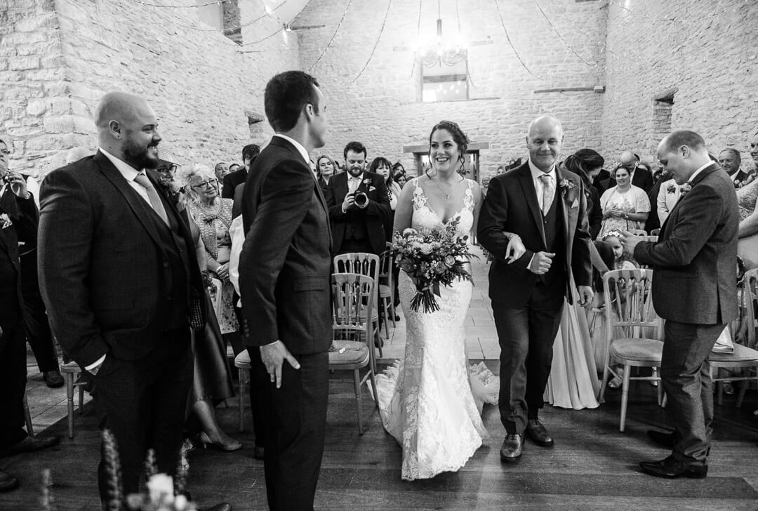 Groom watches bride enter the Wedding ceremony