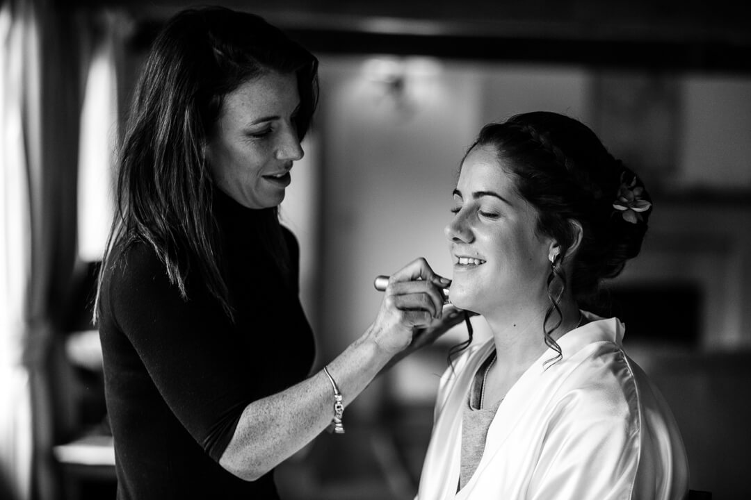 Bride getting ready for Kingscote Barn Wedding