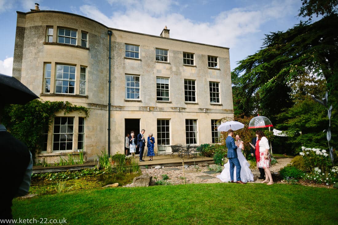 Wedding guests at country house reception