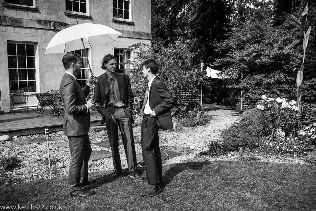 Reportage wedding photo of guests chatting