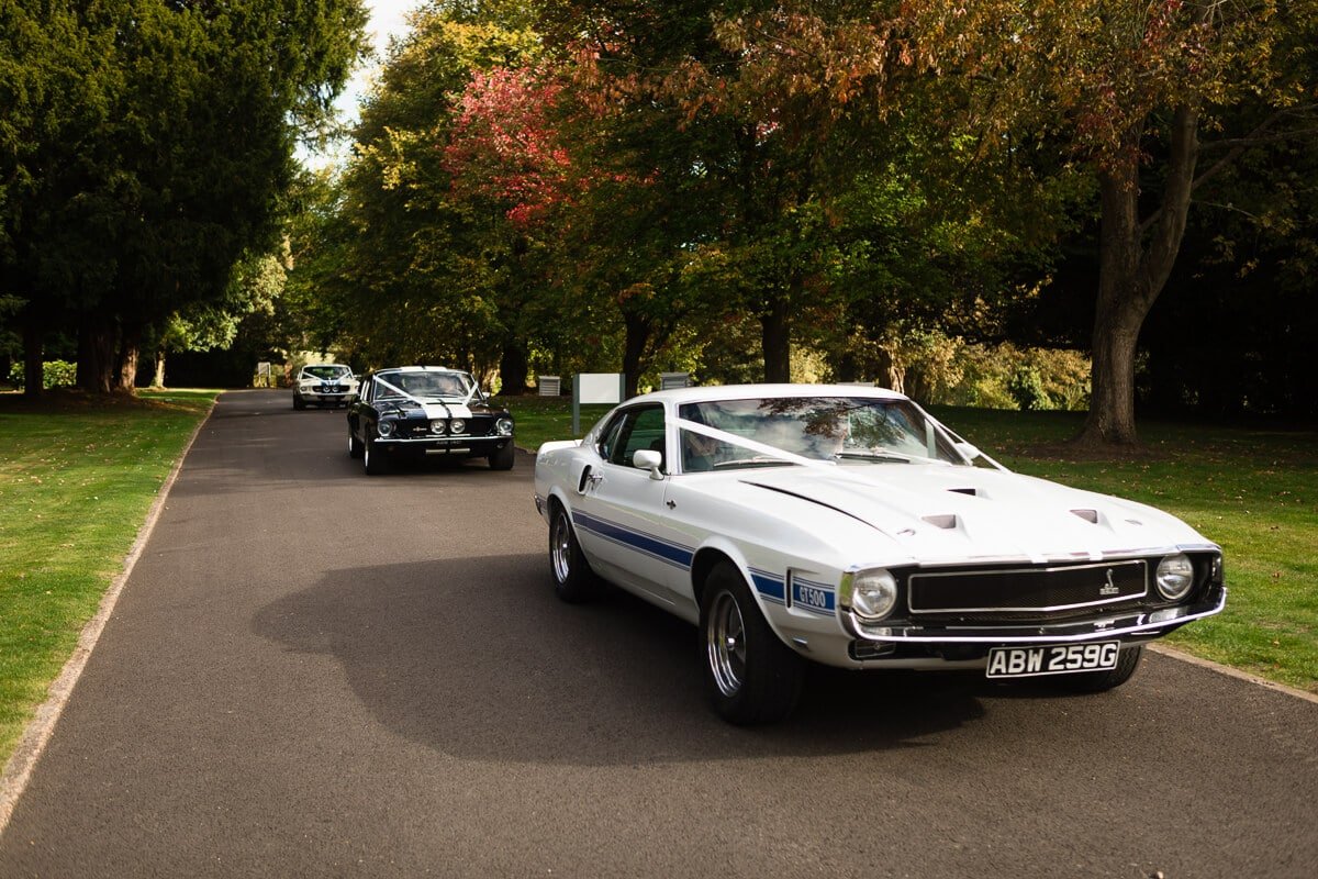 GT 500 American car arrives with bride at wedding