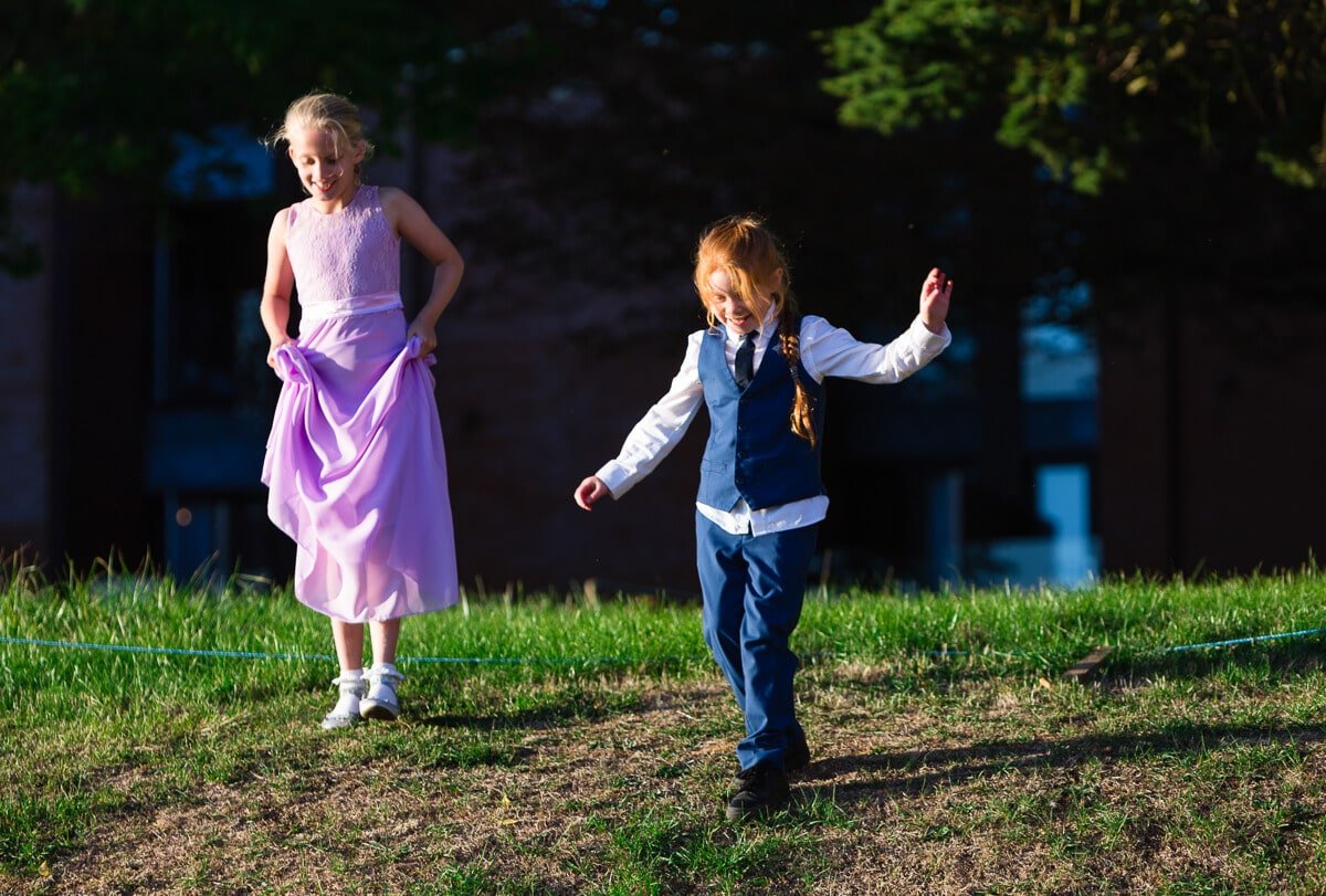 Kids playing at summer wedding