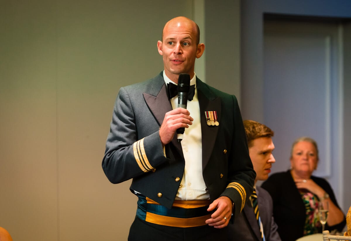 Groom in RAF uniform making speech