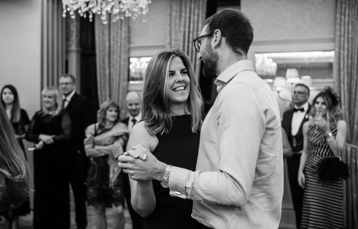 Documentary wedding photo of guests dancing